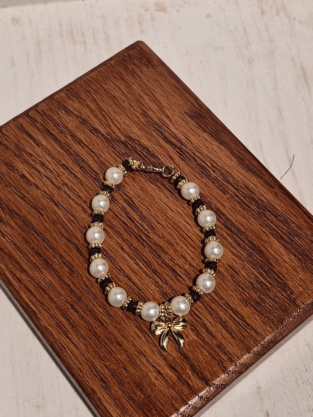 Gold and White Pearl Bracelet with Bow Charm - Women Jewelry